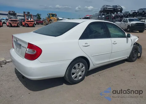 2002 Toyota Camry Le from USA, damaged, VIN 4T1BE32K02U501388